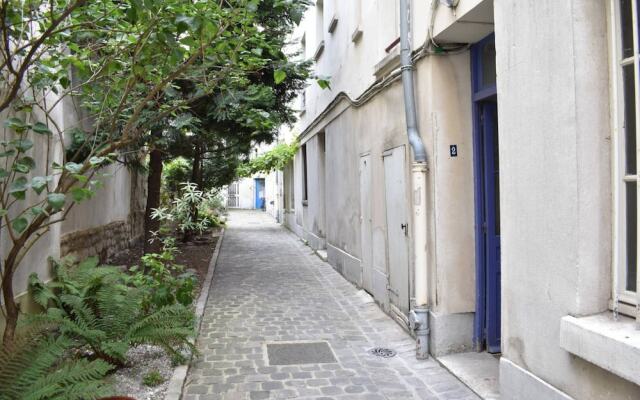 Апартаменты Charming Apartment in Oberkampf Area Париж