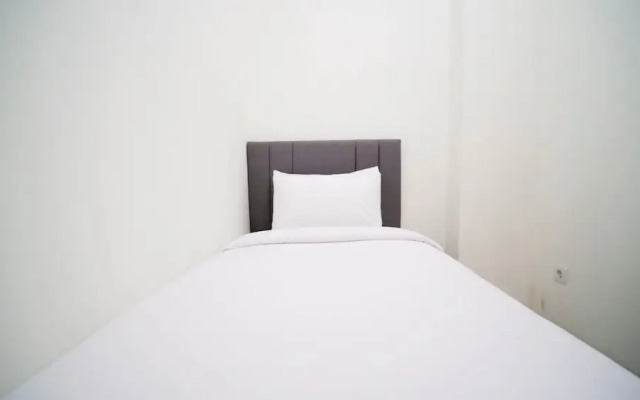 Cozy Living And Tidy 2Br At Puncak Dharmahusada Apartment