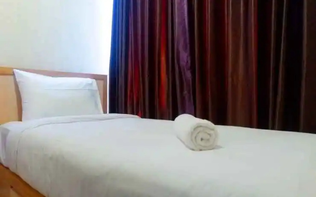 Best View 2BR Apartment at Tamansari Papilio By Travelio
