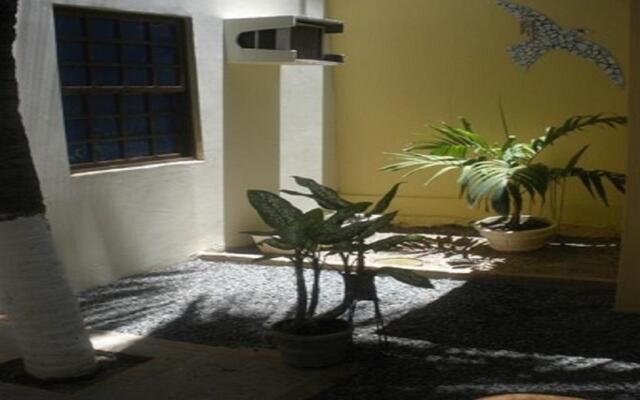 Отель Coqueiros Residence вид на фасад