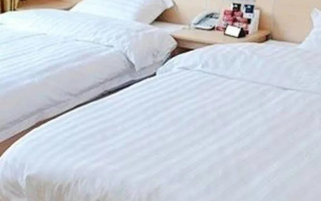 Xingainian Business Hotel