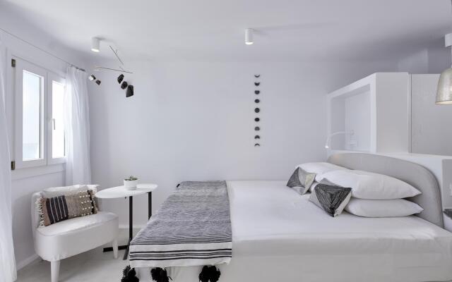 Отель Cosmopolitan Suites комната для гостей