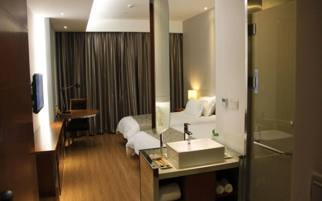 Baolong Homelike Hotel Changxing Branch