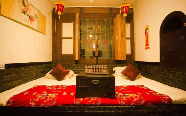 Отель Pingyao Yixingtong Inn