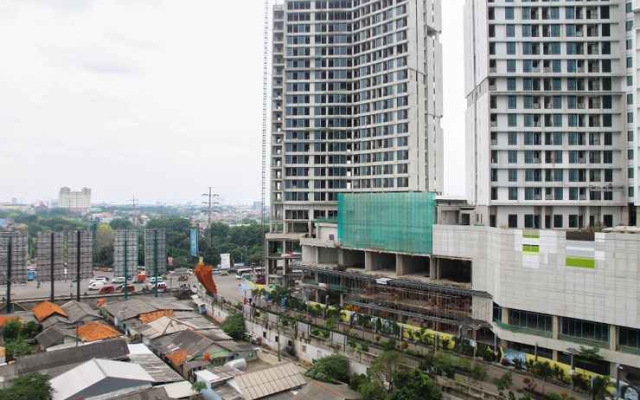 Cozy Studio Grand Dhika City Apartment By Travelio