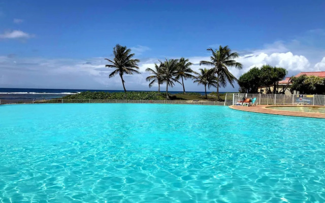 Ti. Maanga vue mer et pieds dans l'eau