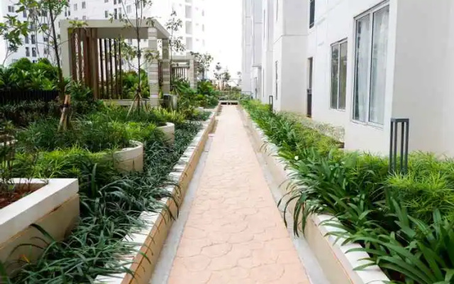 Modern 2BR with City View at Bassura Apartment By Travelio