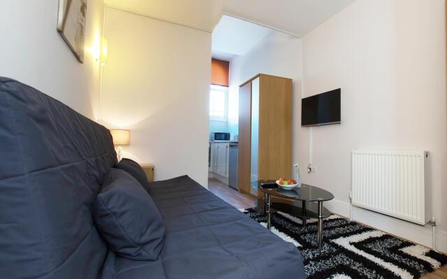 Апартаменты Apple Apartments Kensington Лондон комната для гостей