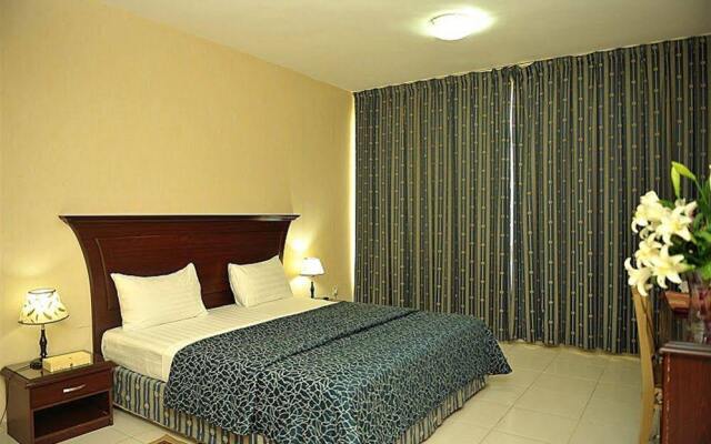 Liwa Plaza Hotel Apartments комната для гостей