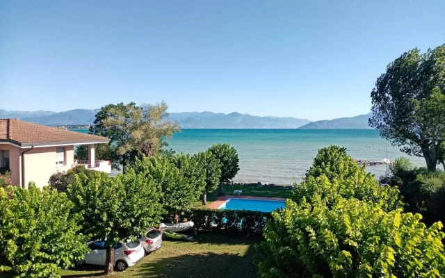 Casa Lugana 8 - monolocale con piscina fronte lago