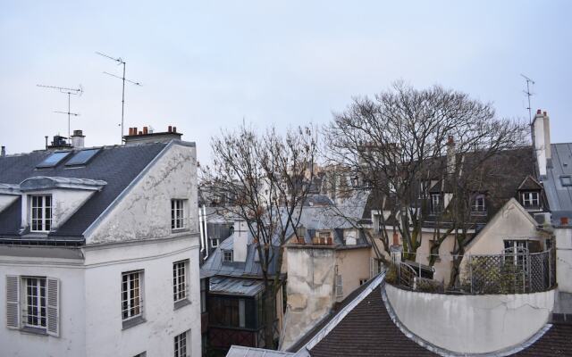 Апартаменты Studio Apartment in Saint-germain-des-prés & Saint-michel комната для гостей
