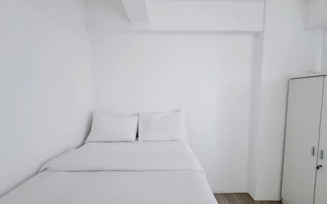 Compact and Restful 2BR at Menara Rungkut Apartment