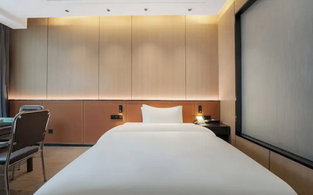 Wanzai Yijia La Maison Hotel