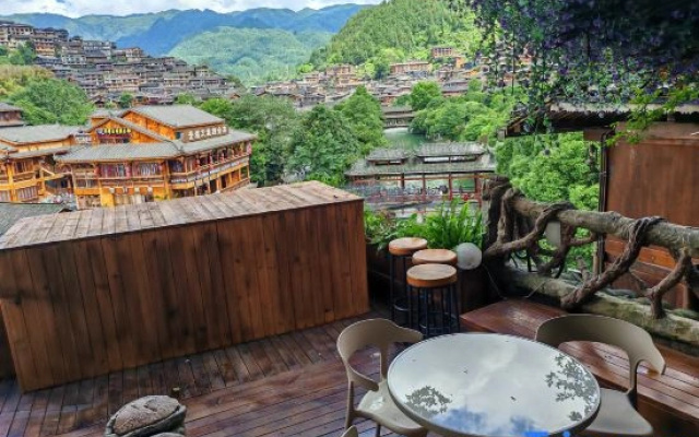 Xijiang Story Vacation Apartment (Xijiang Qianhu Miao Village No. 4 Wind and Rain Bridge)