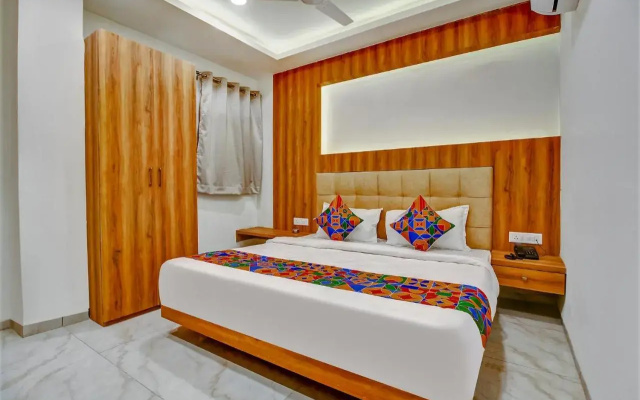 Fabhotel Prime Purple Orchid