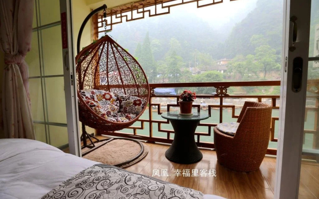 Fenghuang Happy Hotel