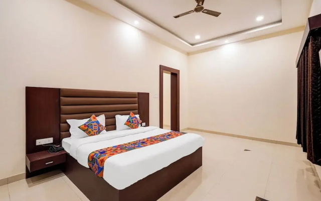 Fabhotel Palm Bliss
