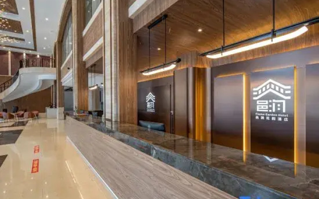 Xinzou Century Hotel (Fenghuang Plaza)