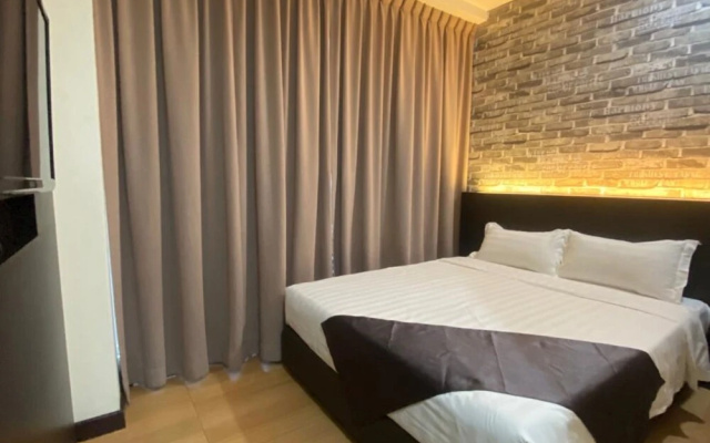 Capital O 90447 Hotel Ezzyhome Kebun Teh