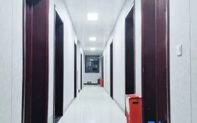 Zhoukou Kaixinyuan Hotel (Baicheng Railway Station)