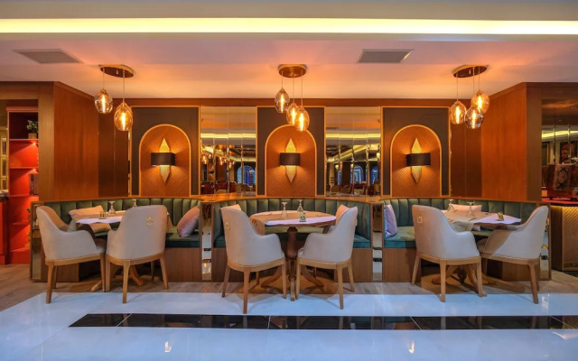 Отель Elysium Deluxe Suites