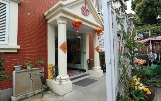 Xiamen Gulangyu Yue Qing Guang Hotel вид на фасад