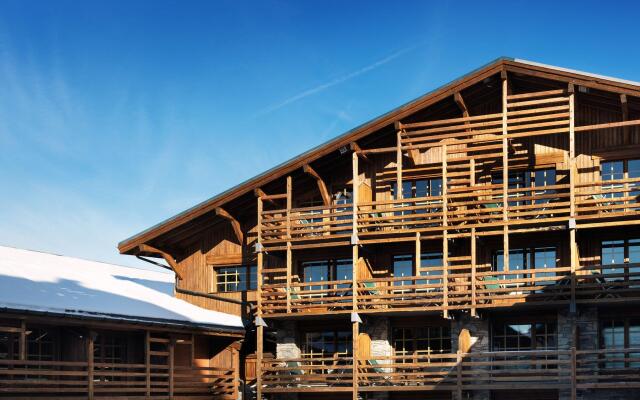 Отель M de Megève вид на фасад