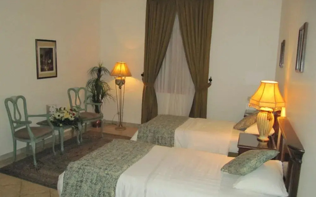 Alfursan Almotahida Hotel Alhamraa dist