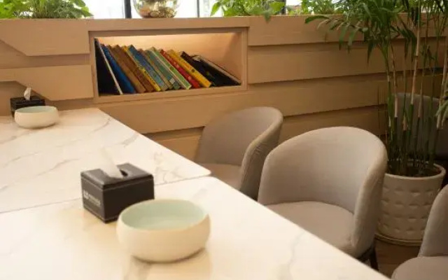 Xin Kai Yue Hotel