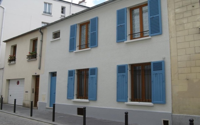 Отель Chambres D'hôtes Haut De Belleville Париж вид на фасад