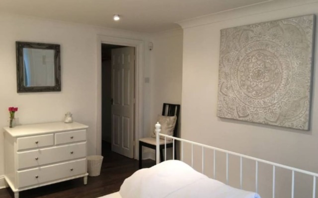 Отель Central 2 Bedroom Seafront Flat in Kemp Town Кемптаун комната для гостей