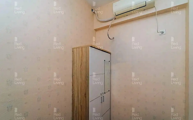 RedLiving Apartemen Tamansari Panoramic - Rasya Room with Netflix