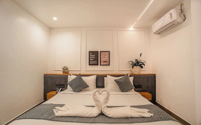 Aura Inn & Suites