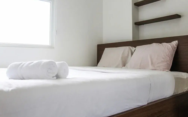 Comfortable and Tranquil 2BR Apartment at Green Pramuka By Travelio