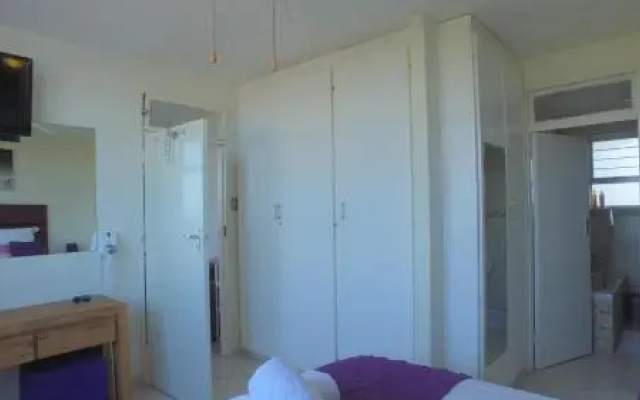 Shangri LA Apartment 208 & 803