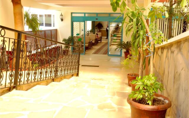 Çinar Family Suite Hotel Турция, Сиде - отзывы, цены и фото номеров - забронировать отель Çinar Family Suite Hotel онлайн вид на фасад