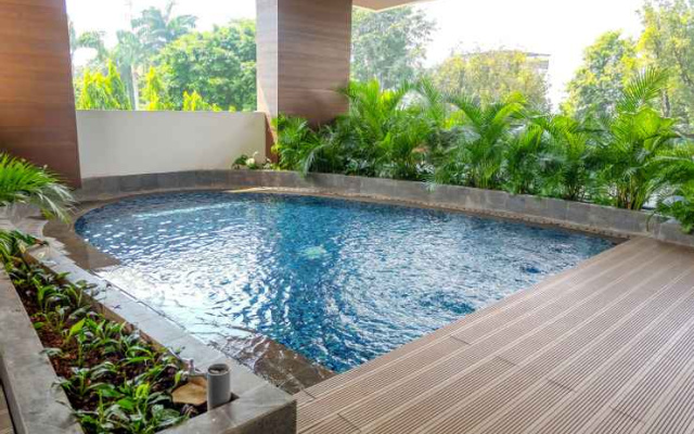Studio Monas View Apartment at Capitol Suites By Travelio