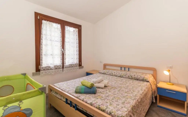 Appartamento con piscina 14