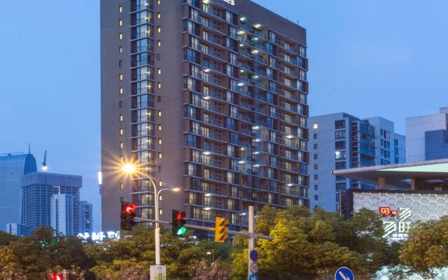 Отель Citadines Xinghai Suzhou вид на фасад