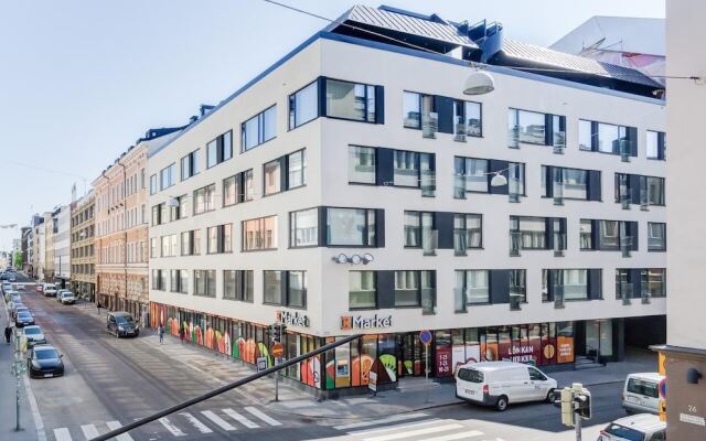 Апартаменты Kotimaailma Apartments Albertinkatu 27B вид на фасад