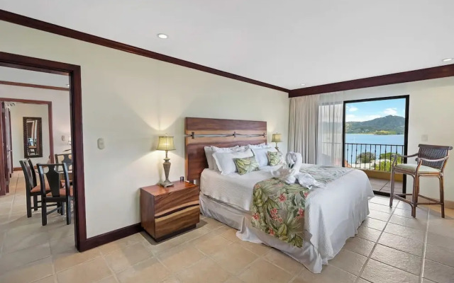 Remodeled Top-Floor Condo with Stunning Wrap-Around Balcony Offering Mountain, Ocean & Marina Views