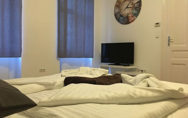 Отель United Homes Apartments Vienna Австрия, Вена - отзывы, цены и фото номеров - забронировать отель United Homes Apartments Vienna онлайн комната для гостей