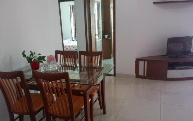 Апартаменты Leyi Family Apartment комната для гостей