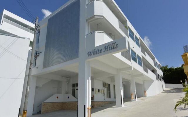 Отель Ocean View Condominium Томигусуку вид на фасад