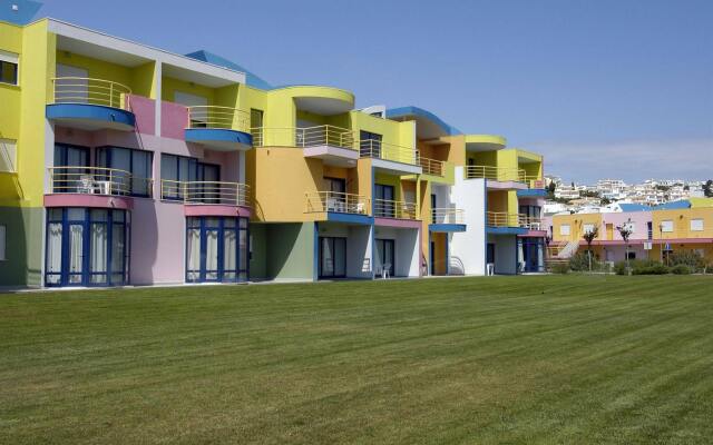 Отель Orada Apartamentos Turísticos Marina de Albufeira Португалия, Албуфейра - отзывы, цены и фото номеров - забронировать отель Orada Apartamentos Turísticos Marina de Albufeira онлайн вид на фасад