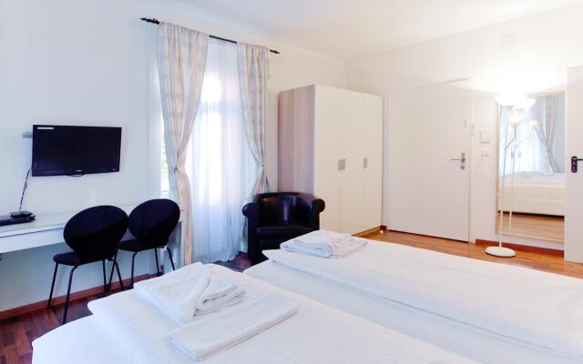 Апартаменты Comfort Apartments By Livingdowntown Цюрих комната для гостей