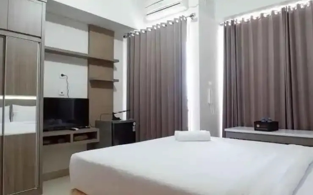 Stylish Living Studio at Apartment Taman Melati Surabaya By Travelio