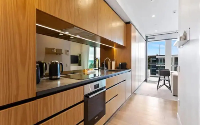 Sleek Modern Studio with Balcony by Zodiak Stays