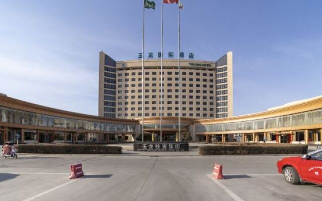 Yulong International Hotel вид на фасад