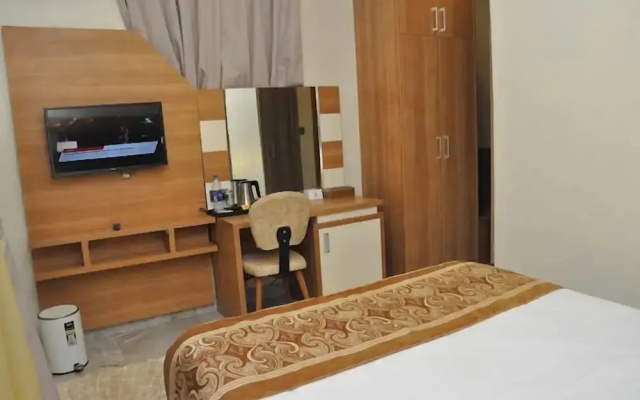 Global Village Hotel and Suites